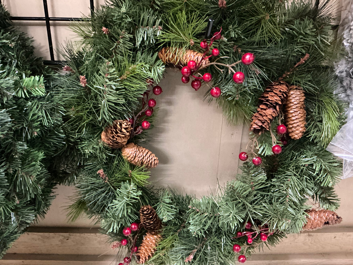 Wreath with berries and pinecones