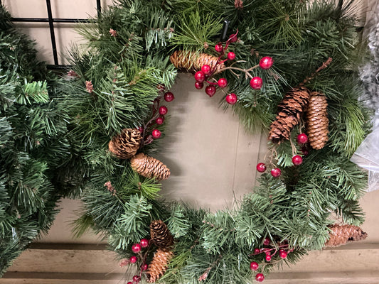 Wreath with berries and pinecones